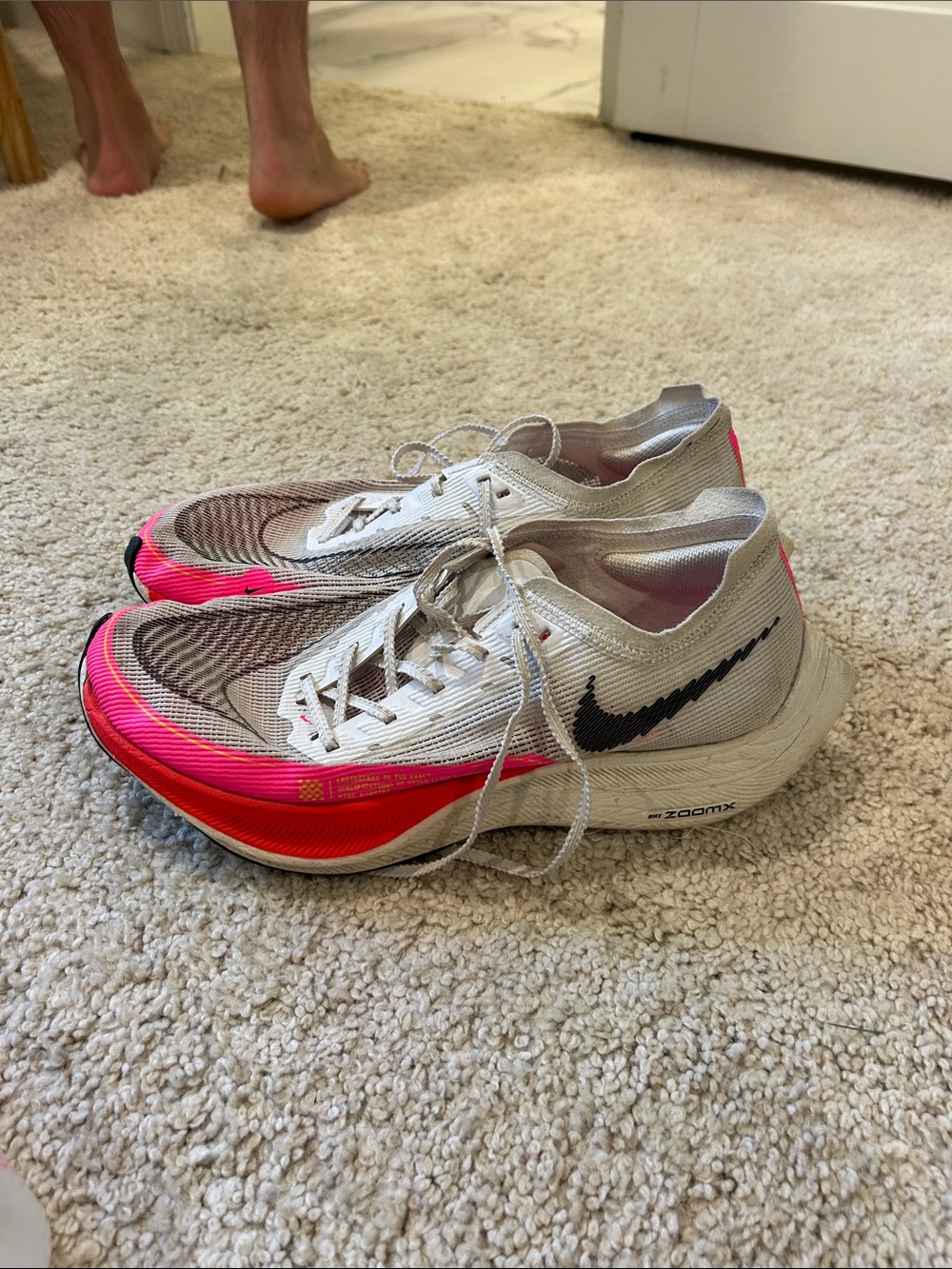 Nike Women's White Pink Running Shoes with Black Swoosh